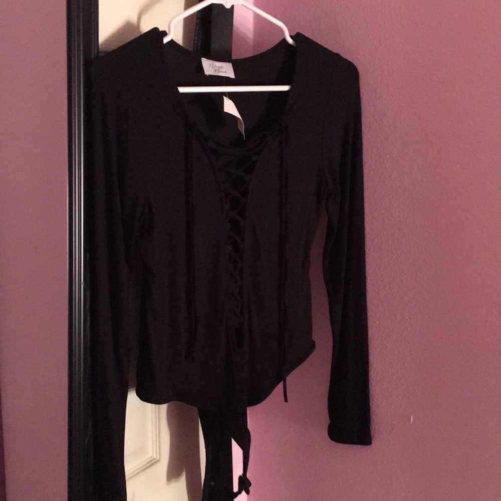 Black long sleeved body suit